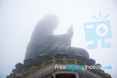 The Enormous Tian Tan Buddha Statue At High Mountain Near Po Lin Monastery, Lantau Island, Hong Kong Stock Photo