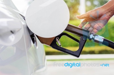 The Fuel Nozzle Inside A Car Stock Photo