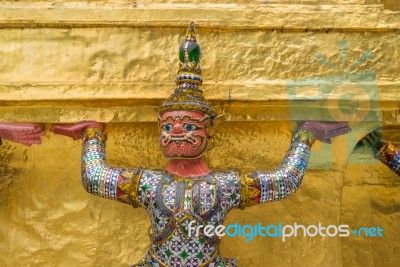 The Giant Statue Supporting Golden Pagoda In The Temple Of The Emerald Buddha (wat Phra Kaew) , Bangkok, Thailand Stock Photo