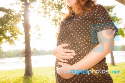 The Girl With The Baby Stock Photo