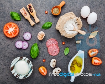 The Ingredients For Homemade Pizza On Dark Sthe Ingredients For Stock Photo