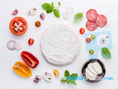 The Ingredients For Homemade Pizza On White Wooden Background Stock Photo