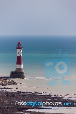 The Lighthouse At Beachey Head Stock Photo