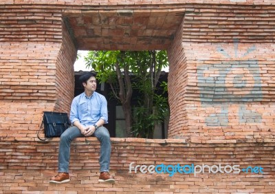 The Man Stands At The Door Stock Photo