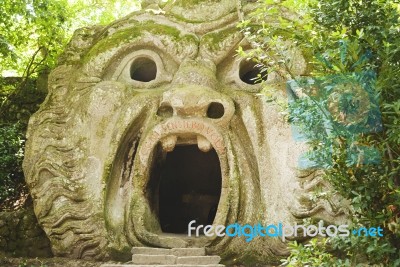 The Mouth Of The Ogre Building Inside The Park Of The Monsters In Bomarzo, Italy Stock Photo