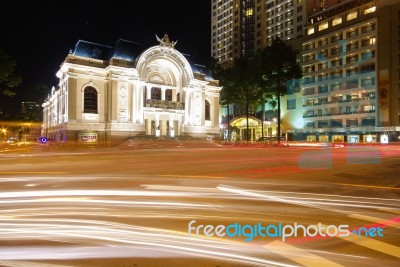 The Opera House Of Saigon Vietnam With Stream Of Passing Traffic… Stock Photo