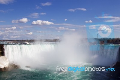 The Ship Is Going To The Mist Of The Waterfall Stock Photo