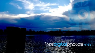 The Sky And River In Twilight Stock Photo