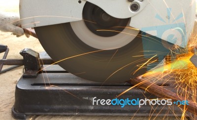 The Smith Is Cutting Steel Stock Photo The Smith Is Cutting Steel Stock Photo