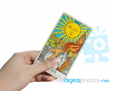 The Sun, Isolate Of Hand Holding Tarot Card Stock Photo