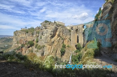 The Waterfall And The Bridge Of Ronda Stock Photo