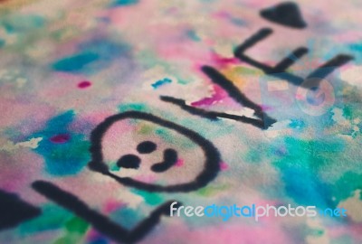 The Word Love Painted With Water Colors Stock Photo