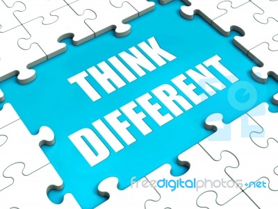 Think Different Puzzle Shows Thinking Outside The Box Stock Image