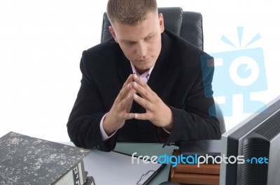 Thinking Businessman In Office Stock Photo