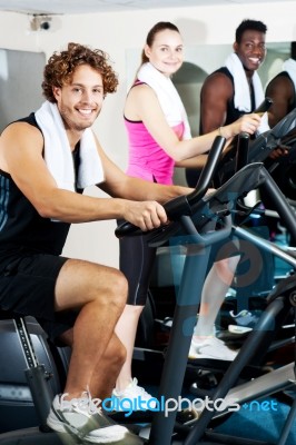 Three People Doing Cardio Training Stock Photo