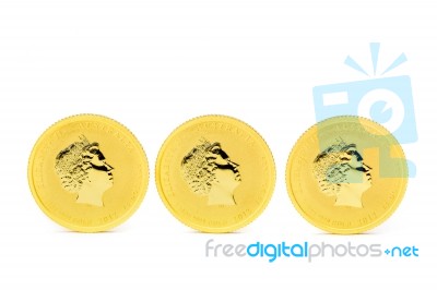 Three Standing Dollar Gold Coins Stock Photo