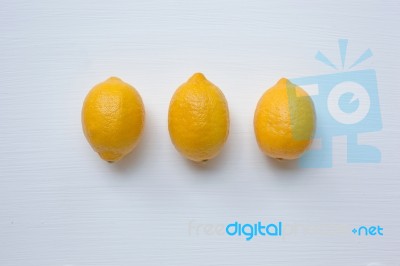 Three Yellow Lemons With On White Stock Photo