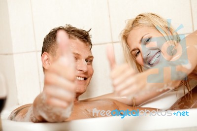 Thumbs Up Couple Bathing Stock Photo