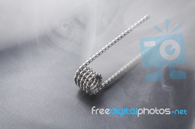 Tiger Coil For Vaping On A Black Background Smoke Stock Photo