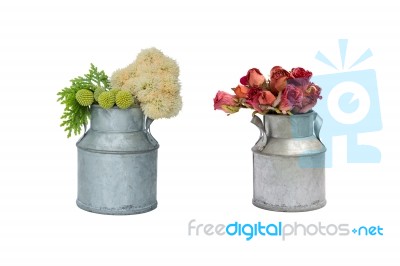 Tin Pot With Fresh And Dry Flower On White Background Stock Photo