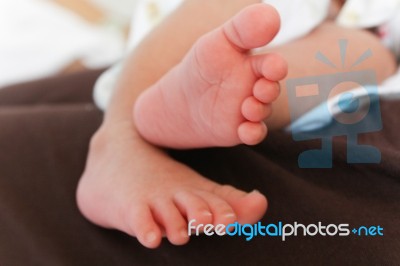 Tiny Newborn Baby Stock Photo