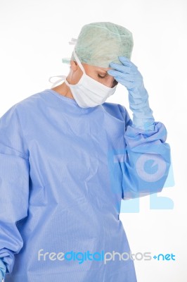 Tired Surgeon Woman Stock Photo
