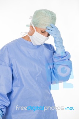 Tired Surgeon Woman Stock Photo