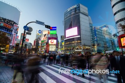 Tokyo - November 28: Pedestrians At The Famed Crossing Of Shibuy… Stock Photo