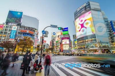 Tokyo - November 28: Pedestrians At The Famed Crossing Of Shibuy… Stock Photo