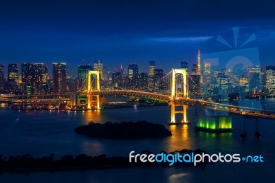 Tokyo Skyline With Rainbow Bridge And Tokyo Tower. Tokyo, Japan Stock Photo