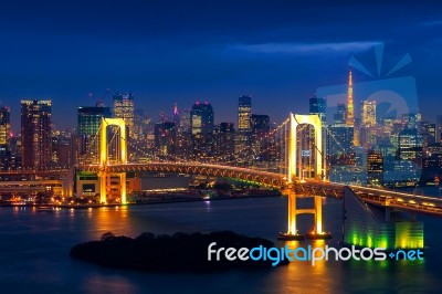 Tokyo Skyline With Rainbow Bridge And Tokyo Tower. Tokyo, Japan Stock Photo