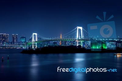Tokyo Skyline With Rainbow Bridge And Tokyo Tower. Tokyo, Japan Stock Photo