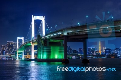 Tokyo Skyline With Rainbow Bridge And Tokyo Tower. Tokyo, Japan Stock Photo