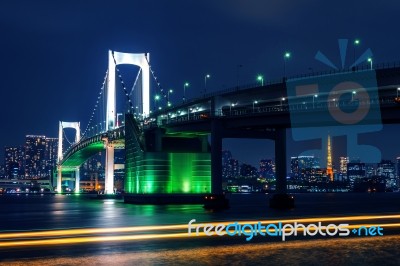 Tokyo Skyline With Rainbow Bridge And Tokyo Tower. Tokyo, Japan Stock Photo