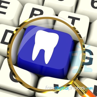 Tooth Key Magnified Means Dental Appointment Or Teeth Stock Image