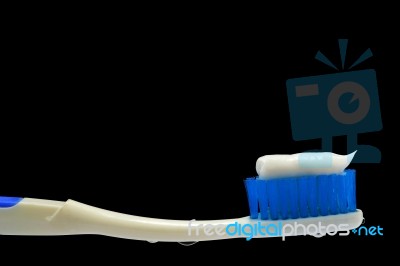 Toothpaste On Toothbrush Stock Photo