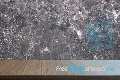 Top Of Wood Table On Old Concrete Wall Background Stock Photo