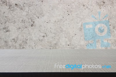 Top Of Wood Table On Old Concrete Wall Background Stock Photo