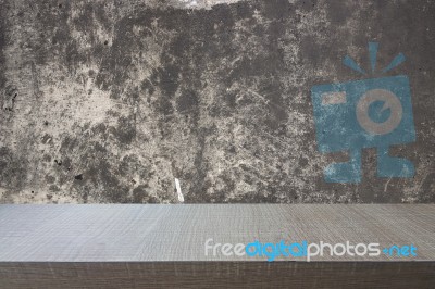 Top Of Wood Table On Old Concrete Wall Background Stock Photo