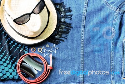 Top View Of Summer Accessories For Modern Woman On Denim Jean Ba… Stock Photo