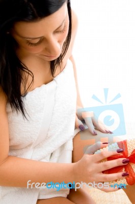 Top View Of Woman Scrubbing Her Body With White Background Stock Photo