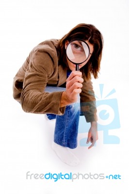 Top View Of Young Man Looking Through Lens Stock Photo