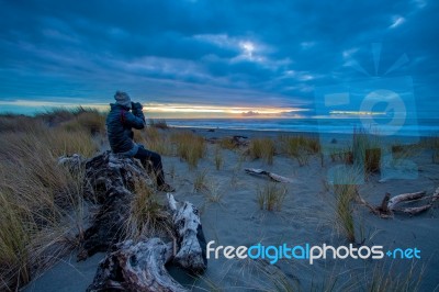 Tourist Man Taking A Photography At Hokitika Beach South Island New Zealand Important Traveling Destination In West Coast Stock Photo