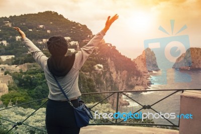 Tourist Woman Standing On Capri Island View Point Most Popular Traveling Destination In South Italy Stock Photo
