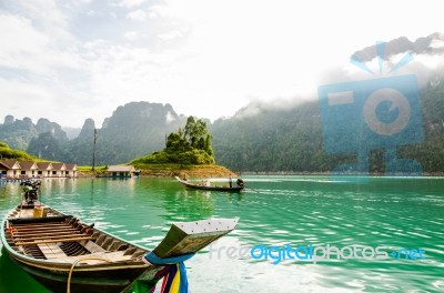 Tourists Arriving For An Overnight Stay By Longtail Boat In The Morning Stock Photo