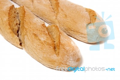 Traditional Baguette On White Background Stock Photo