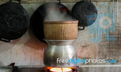 Traditional Culture Cooking Sticky Rice In Thailand And Laos Stock Photo
