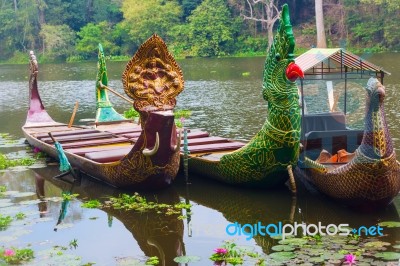 Traditional Khmer Boats With Carved Bows Stock Photo
