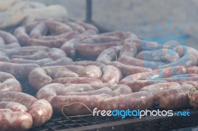 Traditional Meat Grilled On The Grill In The Argentine Countryside Stock Photo