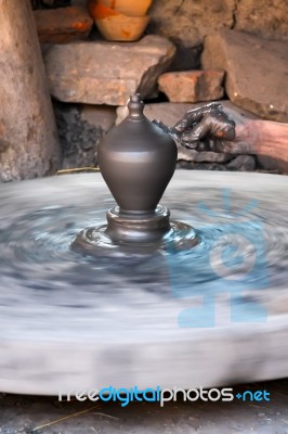 Traditional Pottery Craftsmanship Stock Photo